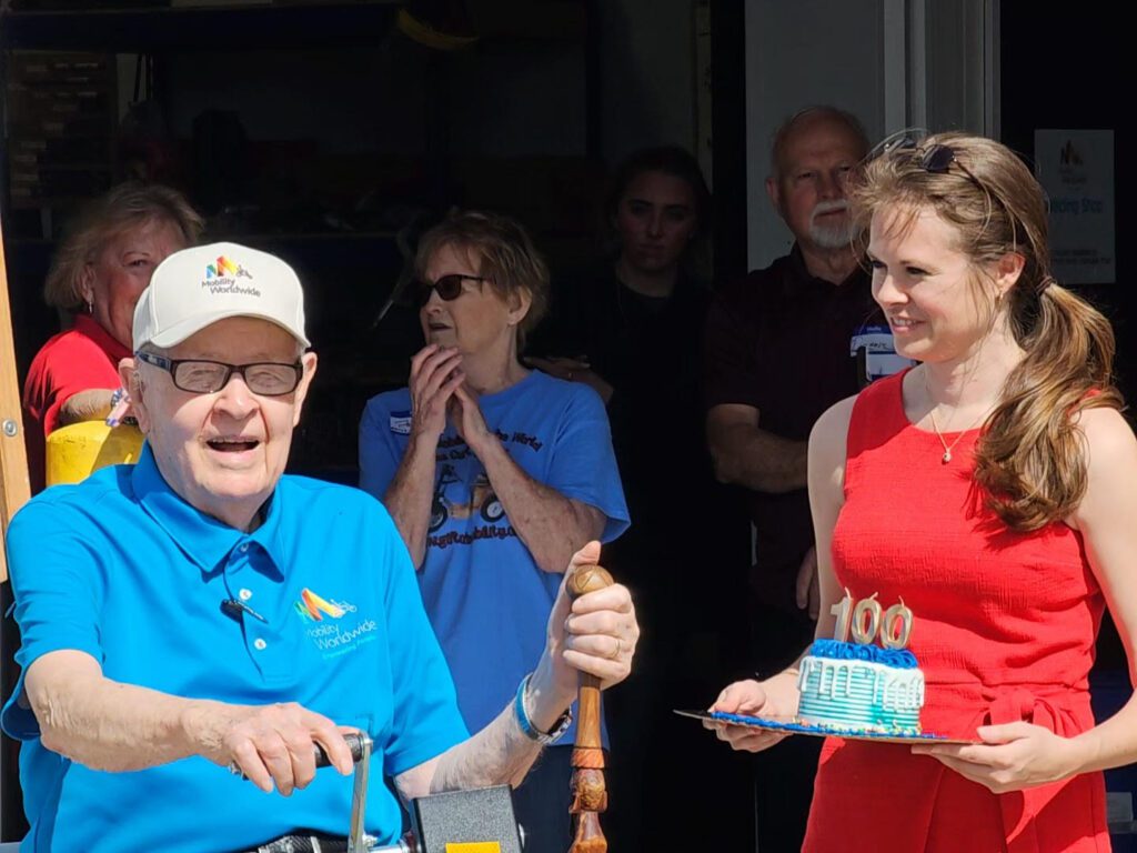 100th Birthday Open House Erin Twenter Presents Cake 2024 May 9